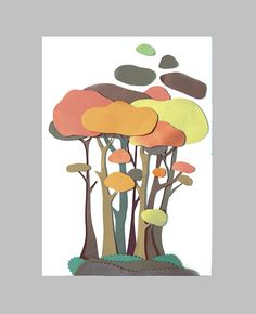 a card with trees and rocks in the shape of circles on it's sides