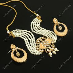 This is a stunning handmade necklace perfect for high end Jewelry Collector, a keeper in Traditional Vintage Indian/Pakistani Bridal jewelry and a Luxury Gift for your Daughter, Sister or Wife on Wedding or Anniversary. Perfect for any type of occasions, weddings And celebrations and a beautiful & memorable gift for weddings and special occasions. Description  Item Code:- L Gold Plated Peach Meenakari Chik Necklace Set Necklace Measures- Adjustable with a Dori/Cord Earring Measures- 52x40mm approx Quantity- One Necklace Set Please see more different designs here:- https://www.etsy.com/in-en/shop/LUCKYJEWELSART?ref=seller-platform-mcnav I make every item of my collection with a lot of love and care, I pay attention to every detail.  You are more than welcome to contact me for any question y Luxury Gold Plated Kundan Necklace, Luxury Meenakari Designer Necklaces, Luxury White Meenakari Necklace, Luxury Gold-plated Kundan Necklace Gift, Layer Pearl Necklace, Traditional Wedding Jewellery, Pakistani Bridal Jewelry, Layered Pearl Necklace, Designer Handmade Jewellery