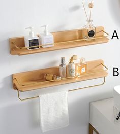 two wooden shelves with soap and lotion on them