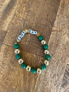 Green & gold game day bracelet Gold Beaded Bracelet, Gold Bead Bracelets, Green Gold, Gold Beads, Game Day, Green And Gold, Beaded Bracelet, Beauty Book, Jewelry Bracelets