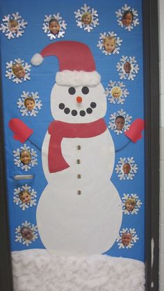 a door decorated with a snowman wearing a santa hat and scarf, surrounded by snowflakes