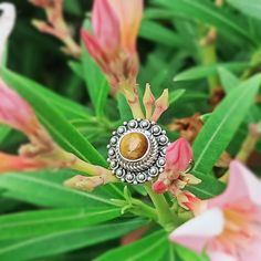 Handmade Tiger-eye bohemian ring , you can wear this ring as a party wear ring .. Title - Tiger-eye stone ring Stone color - Brown Stone shape - Round Material - Sterling silver 925 Note - (1) We use natural gemstones, so color shade may be little bit different .. (2) This is very delicate ring , it only covers by the corners . we are giving you best quality rings on best price .. contact us for more quantity Bohemian Flower Ring Stamped 925, Handmade Bohemian Sterling Silver Flower Ring, Bohemian Gemstone Flower Ring As Gift, Adjustable Bohemian Flower Ring, Bohemian Flower Ring With Gemstone, Quality Rings, Tiger Eye Ring, Tigers Eye Gem, Bohemian Ring