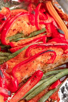 chicken, green beans and red peppers on tin foil