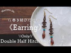 earrings on a plate with the words earning only $ 1 / double half pitch knot