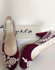 Burgundy wedding shoes designed with ivory lace appliques, rhinestones add extra sparkle... Bridal shoes to keep you comfortable all night long and compliment your dress in an elegant way. #travelwedding #weddingshoes #burgundywedding #bridalshoes Burgundy Bridal Shoes, Burgundy Wedding Shoes Brides, Maroon Wedding Shoes, Wedding Shoes Burgundy, Embellished Lace Wedding Shoes, Elegant Embellished Heels For Ceremony, Wedding Shoes Bride Red, Elegant Pearl Embellished Wedding Shoes For Reception, Burgundy Wedding Shoes