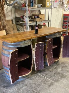 a table made out of wine barrels in a shop