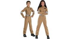 two children in uniforms standing next to each other