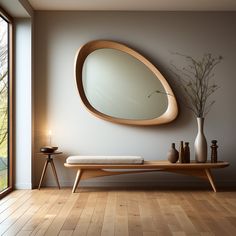 a wooden bench sitting in front of a round mirror on the side of a wall