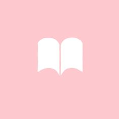 an open book on a pink background with the word love written in white over it