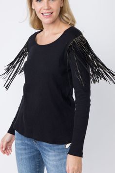 Vocal Casual ribbed long sleeve top with studded suede fringe drape on shoulders. Boho, festival, basic. Stunning detail. Color: Black Sizes: S-M-L-XLBust flat 32-34-36-38, fabric is stretchy, Length 25 100% Cotton, Made in USA X/18570L Trendy Fringe Tops For Night Out, Fitted Long Sleeve Top With Fringe, Casual Fringe Tops For Night Out, Chic Long Sleeve Fringe Tops, Chic Long Sleeve Tops With Fringe, Black Tops With Tassels For Night Out, Chic Spring Top With Rhinestone Fringe, Long Sleeve Tops With Tassels For Fall, Fringe Tops For Fall Party