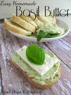 there is a plate with some bread and green leaves on it