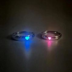 INCLUDES: (1) Pair Glow in the Dark Adjustable Matching Rings for Couples - or - (1) Glow in the Dark Adjustable Matching Rings for Couples SPECIFICATIONS: Metal: Zinc Alloy Color: Silver Size: About 1.8 cm inner diameter before adjustment (opening adjustable) DESCRIPTION: Ignite the magic of your connection with these Glow in the Dark Adjustable Matching Rings for Couples. Crafted with love and luminosity, these rings offer a unique and enchanting way to symbolize your bond. Made from high-qual Couple Rings Silver, خواتم خطوبة, Dark Rings, Pave Setting Ring, Bff Jewelry, Light Jewelry, Ring Man, Idee Cosplay, Pola Gelang