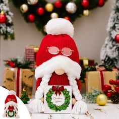 a santa clause hat and sunglasses on top of a table with presents in the background