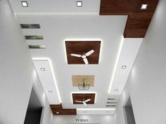 an empty room with white walls and wooden ceiling