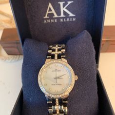 Elegant Silver With Crystal Bezel, Dial And Band Embellishments. Dial Is Mother Of Pearl With Crystal Numeral Markings. Band Has Crystals Extending From Face. This Watch Is Water Resistant To 100 Ft. With Mineral Crystal Lens. Safety Clasp With Ak Initials. Runs Perfectly. Brand New In Original Box With Warranty Card. Anne Klein Watch Silver, Ladies Watch, Minerals Crystals, Anne Klein, Accessories Watches, Mother Of Pearl, Womens Watches, Embellishments, Original Box