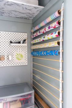 an organized closet with lots of crafting supplies