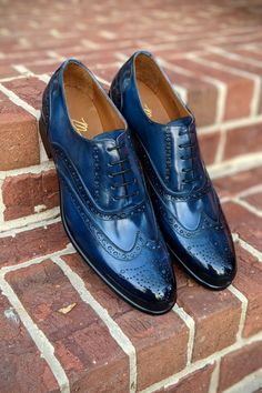 Tired of the typical black and brown shoes? Give our Sapphire blue a try! We hope you won't mind people staring at your feet! Patent Leather Wingtip Oxfords, Designer Wingtip Oxfords With Goodyear Welted, Designer Goodyear Welted Wingtip Oxfords, Fitted Leather Shoes With Brogue Detailing And Snip Toe, Designer Fitted Oxfords With Brogue Detailing, Patent Leather Wingtip Shoes For Semi-formal, Patent Leather Wingtip Shoes For Semi-formal Occasions, Snip Toe Oxfords With Brogue Detailing, Fitted Snip Toe Oxfords With Rubber Sole