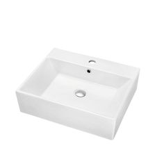 a white sink sitting on top of a counter