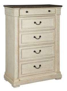 a white dresser with drawers and handles