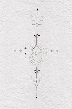 the cross is drawn in black ink on white paper with an intricate design and decorative elements