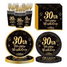 black and gold 30th birthday party supplies including plates, cups, napkins and forks