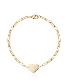 Aurelia Demark's signature heart bracelet shows your love in a simple and elegant way. Leave it plain or engrave it to mark a significant moment... a baptism, a new baby, your wedding date, your lover's nickname...the list goes on. Either way, you'll smile and feel the love. 18k Yellow Gold Lobster claw clasp Machine or hand engraving available, email info@annapjay.com to inquire Made in NYC Classic Gold Heart Charm Bracelet, Classic Heart-shaped Bracelets With Polished Finish, Classic Gold Bracelet With Heart Charm, Classic Heart Chain Bracelet For Valentine's Day, Classic Heart Bracelets For Valentine's Day, Classic Heart-shaped Bracelets For Valentine's Day, Classic Heart-shaped Chain Bracelet For Valentine's Day, Minimalist Wedding Bracelet With Heart Charm, Wedding Minimalist Bracelet With Heart Charm