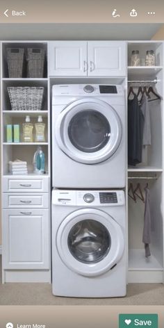 a white washer and dryer sitting next to each other in a laundry room