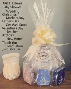 a gift basket with candles and other items for someone's special day or birthday