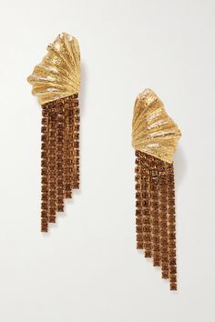 Oscar de la Renta's sculptural earrings are inspired by the beauty of the sea. Made from gold-tone metal, they're shaped into shells that are carefully carved for a realistic texture, and adorned with crystal-embellished fringe. Elegant Shell-shaped Brass Jewelry, Elegant Shell-shaped Metal Earrings, Elegant Shell-shaped Earrings, Elegant Gold-plated Shell-shaped Earrings, Elegant Shell-shaped Gold Plated Earrings, Elegant Shell-shaped Metal Jewelry, Luxury Brass Earrings With Plating, Luxury Plated Brass Earrings, Elegant Gold Shell Earrings