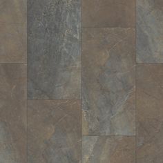 an image of a tile floor that looks like it is made out of slate or stone