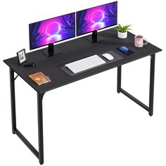 two computer monitors sitting on top of a black desk