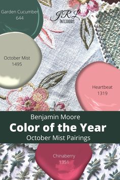 the color of the year is pink, green and white with floral designs on it