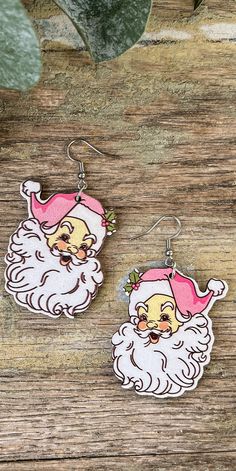 Evoke nostalgia with Adorable Vintage Christmas Earrings. Festive and rustic, these earrings bring timeless holiday cheer to your look. Measures 2 inches Metal: Zinc Alloy, good for 99% of allergies Vintage Christmas Earrings, Santa Earrings, Wooden Santa, Book Jewelry, Wood Christmas, Yellow Earrings, Holiday Jewelry, Christmas Earrings, Wood Earrings