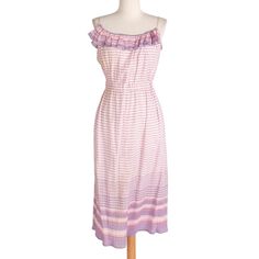 Adorable summer dress with purple and pink stripes. Has a ruffled collar and string shoulder straps. Made by Betty Hanson.  Measurements Bust: 32-40" Waist: 22-32" Hips: 46" Length: 38" Sweep: 46" Condition: Good; stains throughout (See images) Untreated by us. Purple Ruffled Sundress For Summer, Purple Ruffled Sundress For Beach, Spring Purple Sundress With Ruffles, Feminine Striped Summer Dress, Rose Vintage, Ruffled Collar, Pink Vintage, Sun Dress, Pink Stripes