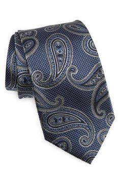 Paisleys swirl in subtle colors on a tie crafted for versatility and distinction from textured silk. 3 1/2" width; 62 1/2" length 100% silk Dry clean Imported Elegant Paisley Print Neckwear For Business, Elegant Semi-formal Neckwear With Paisley Print, Elegant Business Suit And Tie Accessories With Paisley Print, Elegant Patterned Ties With Paisley Print, Elegant Patterned Neckwear For Formal Occasions, Elegant Formal Patterned Neckwear, Elegant Patterned Neckwear With Ties, Formal Patterned Ties With Paisley Print, Elegant Black Tie Suit Accessories With Paisley Print