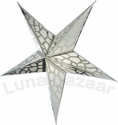 an origami star is shown against a white background