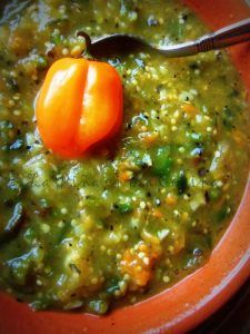 a bowl filled with soup and a spoon