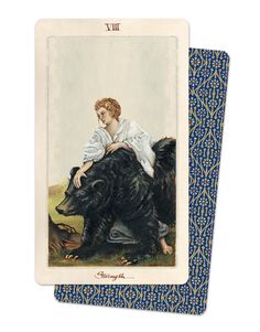 a tarot card with an image of a woman sitting on top of a bear