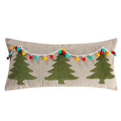 a decorative pillow with christmas trees on the front and lights hanging down from it's sides