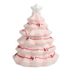 a pink ceramic christmas tree ornament with red beads and a star on top