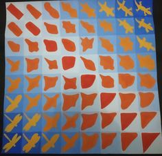 an orange and blue pattern with small airplanes on it's sides, in different colors