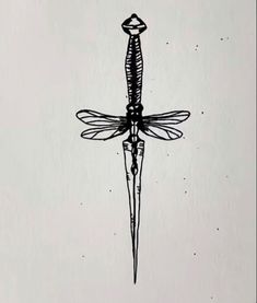 a black and white drawing of a dragonfly with a diamond on it's tip