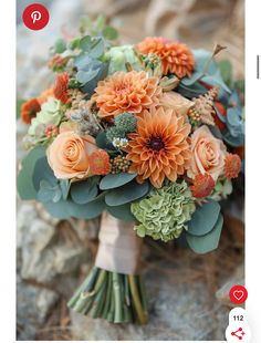 an image of a bridal bouquet with orange flowers