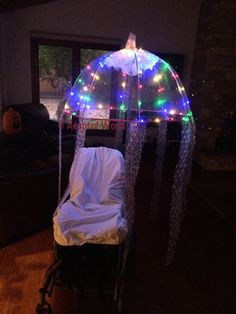 an umbrella that has been decorated with lights