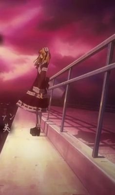 a woman standing on top of a metal railing next to a pink sky with clouds