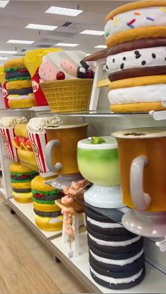 there are many hamburgers and cakes on the shelves