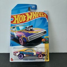 a hot wheels car with flames on it