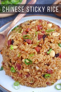 chinese sticky rice on a plate with chopsticks