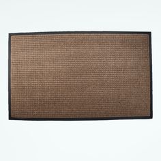 a brown door mat with black trim on the bottom and sides, against a white background