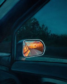 a rear view mirror on the side of a car